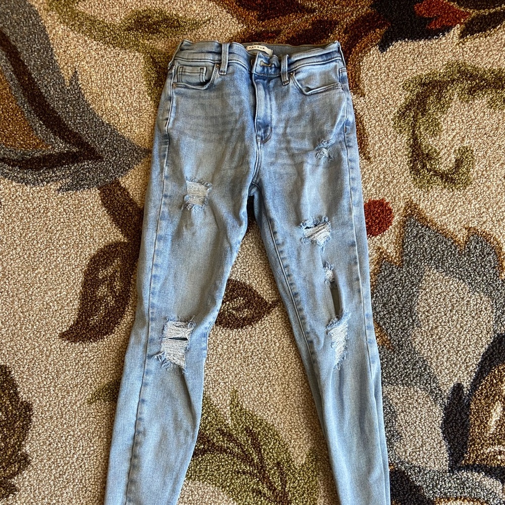 Blue ripped skinny jeans